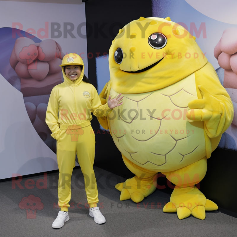 Lemon Yellow Glyptodon mascot costume character dressed with a Jumpsuit and Anklets