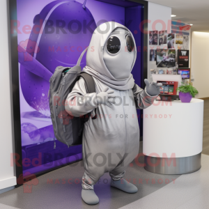 Silver Eggplant mascot costume character dressed with a Hoodie and Briefcases