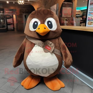 Brown Penguin mascot costume character dressed with a Dungarees and Foot pads