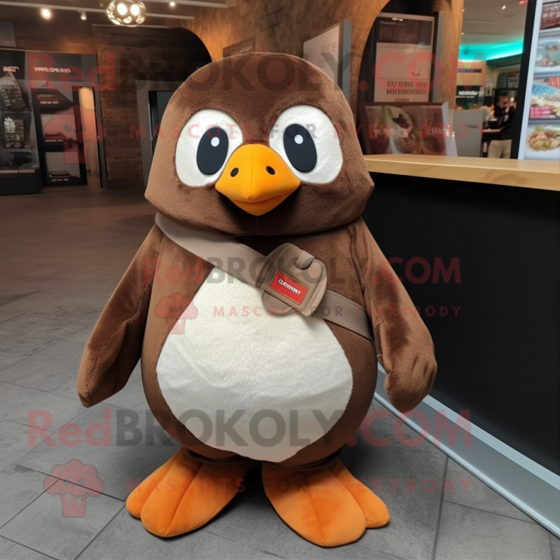 Brown Penguin mascot costume character dressed with a Dungarees and Foot pads