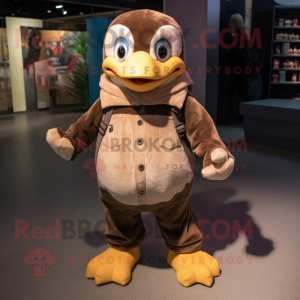Brown Penguin mascot costume character dressed with a Dungarees and Foot pads