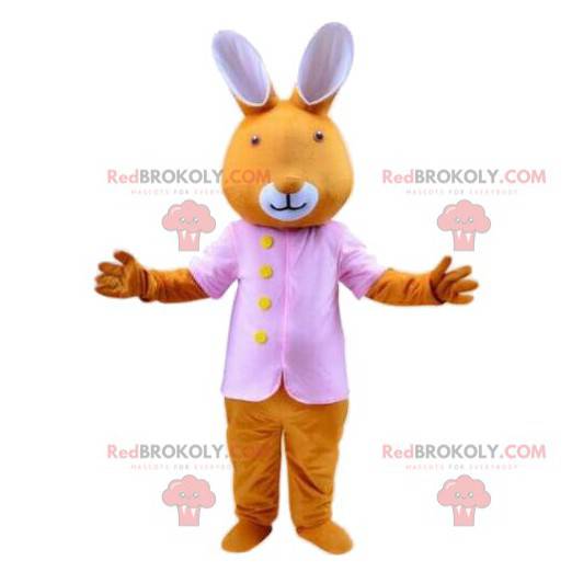 Oranje konijn mascotte met een roze jasje, paaskostuum -
