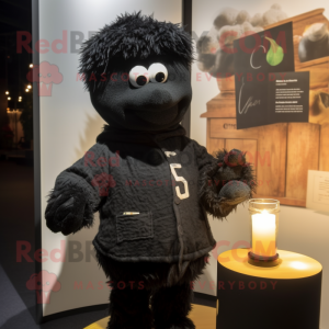 Svart doftljus maskot...