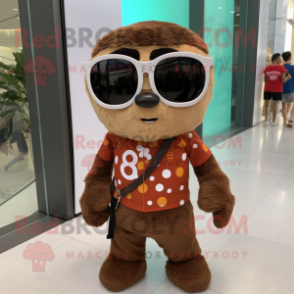Brown Pendant mascot costume character dressed with a Romper and Sunglasses