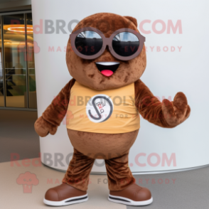 Brown Pendant mascot costume character dressed with a Romper and Sunglasses
