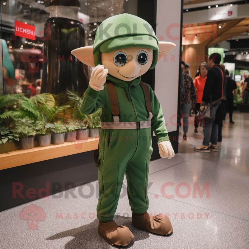 Olive Elf mascot costume character dressed with a Jumpsuit and Caps Olive Elf mascot costume character dressed with a Jumpsuit and Caps