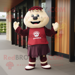 Maroon Rainbow mascot costume character dressed with a Rugby Shirt and Shawl pins