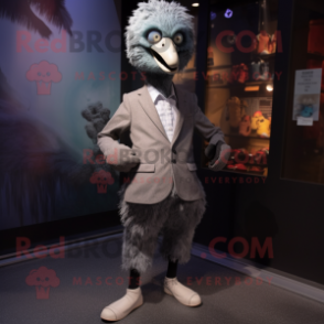 Gray Emu mascot costume character dressed with a Blazer and Shoe laces