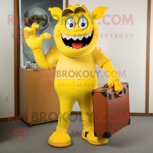 Yellow Devil mascot costume character dressed with a Capri Pants and Briefcases