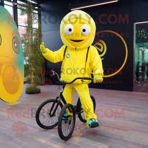 Lemon Yellow Unicyclist mascot costume character dressed with a Hoodie and Keychains