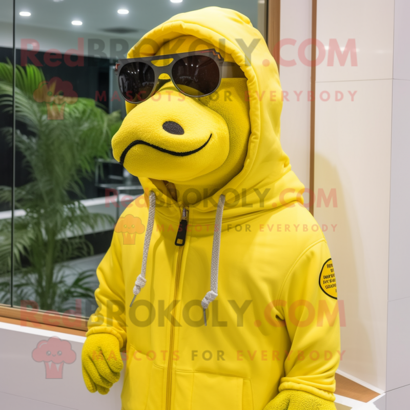 Lemon Yellow Hippopotamus mascot costume character dressed with a Hoodie and Sunglasses Lemon Yellow Hippopotamus mascot costume character dressed with a Hoodie and Sunglasses