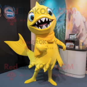 Yellow Barracuda mascot costume character dressed with a Shift Dress and Scarves