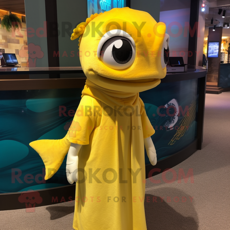 Yellow Barracuda mascot costume character dressed with a Shift Dress and Scarves