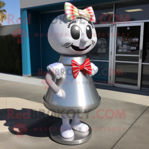 Silver Gumball Machine mascot costume character dressed with a A-Line Skirt and Bow ties