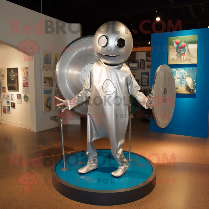 Silver Plate Spinner mascot costume character dressed with a Romper and Messenger bags Silver Plate Spinner mascot costume character dressed with a Romper and Messenger bags