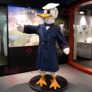 Navy Geese mascot costume character dressed with a Long Sleeve Tee and Caps