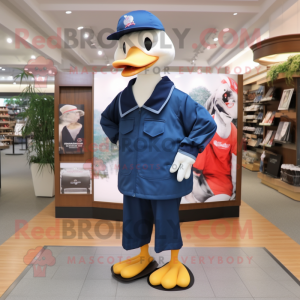 Navy Geese mascot costume character dressed with a Long Sleeve Tee and Caps