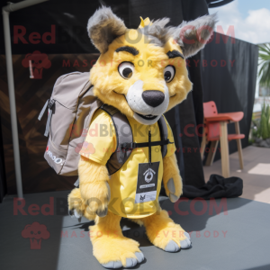 Yellow Hyena mascot costume character dressed with a Poplin Shirt and Backpacks