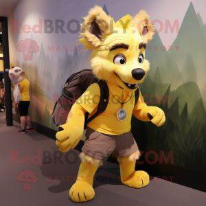 Yellow Hyena mascot costume character dressed with a Poplin Shirt and Backpacks