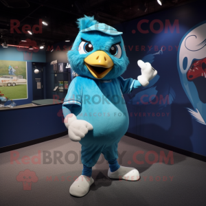 Turquoise Dove mascot costume character dressed with a Baseball Tee and Anklets