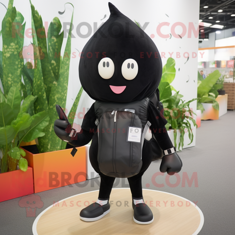 Black Radish mascot costume character dressed with a Rash Guard and Backpacks