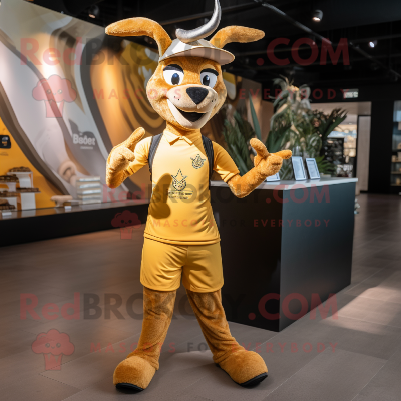 Gold Gazelle mascot costume character dressed with a Joggers and Hats Gold Gazelle mascot costume character dressed with a Joggers and Hats