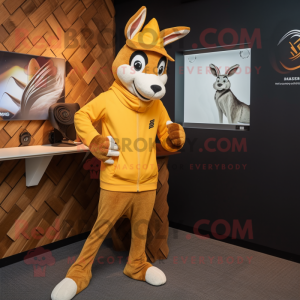 Gold Gazelle mascot costume character dressed with a Joggers and Hats