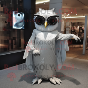 Silver Owl mascot costume character dressed with a A-Line Skirt and Sunglasses