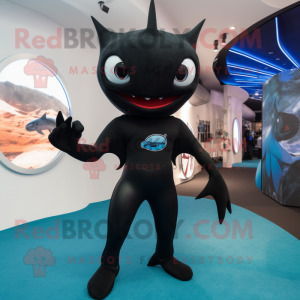Black Manta Ray mascot costume character dressed with a Capri Pants and Lapel pins