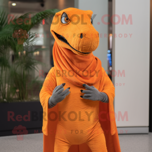 Orange Allosaurus mascot costume character dressed with a Skinny Jeans and Shawl pins