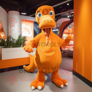 Orange Diplodocus mascot costume character dressed with a Sweatshirt and Tote bags
