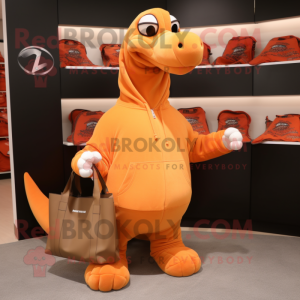 Orange Diplodocus mascot costume character dressed with a Sweatshirt and Tote bags