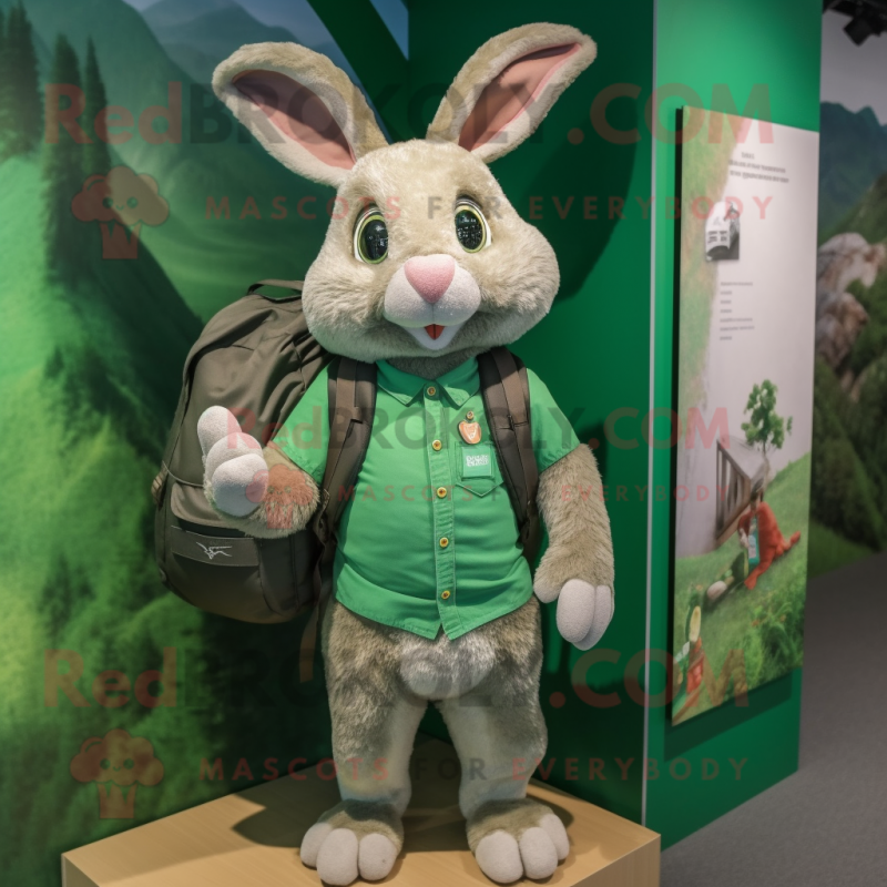 Green Wild Rabbit mascot costume character dressed with a Polo Tee and Backpacks Green Wild Rabbit mascot costume character dressed with a Polo Tee and Backpacks