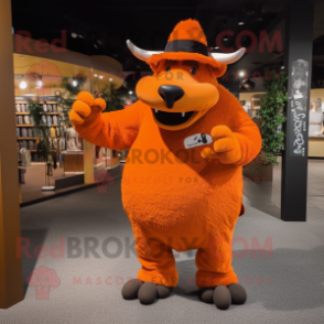 Orange Woolly Rhinoceros mascot costume character dressed with a Capri Pants and Hat pins
