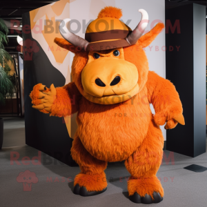 Orange Woolly Rhinoceros mascot costume character dressed with a Capri Pants and Hat pins