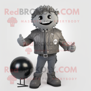 Gray Human Cannon Ball mascot costume character dressed with a Moto Jacket and Lapel pins