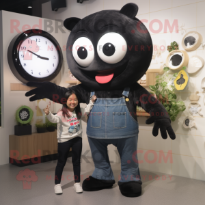 Black Miso Soup mascot costume character dressed with a Mom Jeans and Digital watches