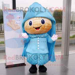 Sky Blue Croissant mascot costume character dressed with a Raincoat and Pocket squares