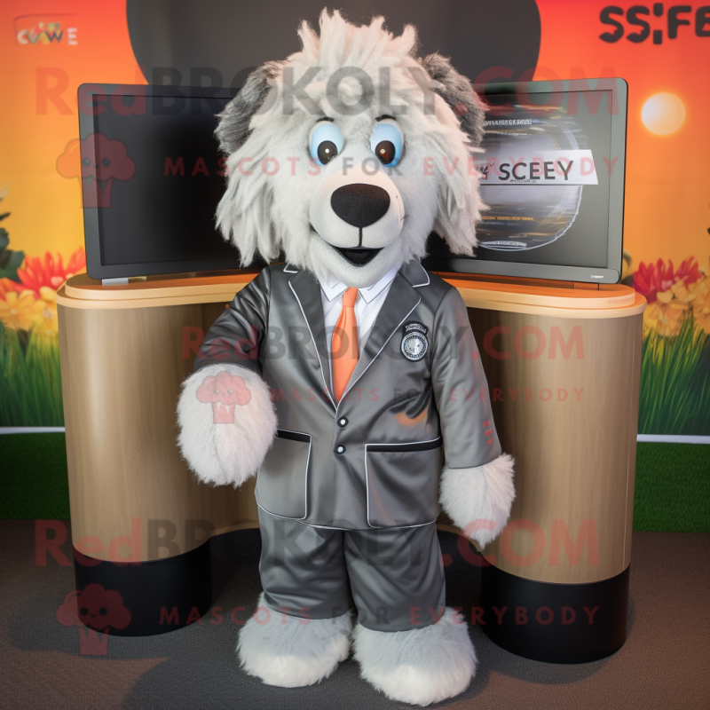Silver Shepard'S Pie mascot costume character dressed with a Blazer and Keychains Silver Shepard'S Pie mascot costume character dressed with a Blazer and Keychains