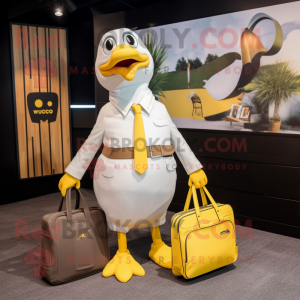 Yellow Seagull mascot costume character dressed with a Blazer and Tote bags