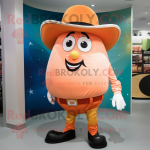 Peach Cowboy mascot costume character dressed with a Capri Pants and Cufflinks