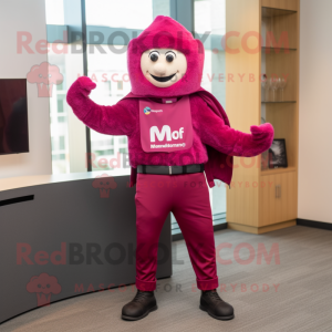 Magenta Momentum mascot costume character dressed with a Cardigan and Belts