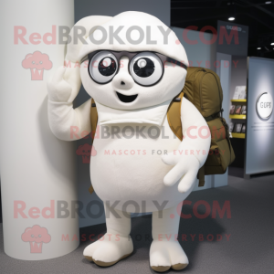 White Cyclops mascot costume character dressed with a Playsuit and Backpacks