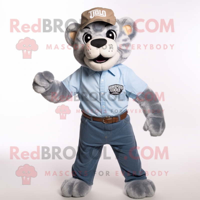 Silver Smilodon mascot costume character dressed with a Chambray Shirt and Caps Silver Smilodon mascot costume character dressed with a Chambray Shirt and Caps