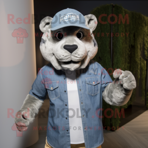 Silver Smilodon mascot costume character dressed with a Chambray Shirt and Caps