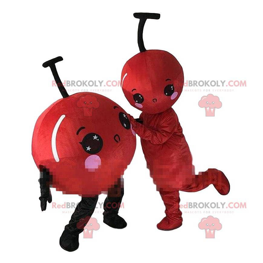 2 maskoter med røde kirsebær, 2 røde frukter, røde epler -
