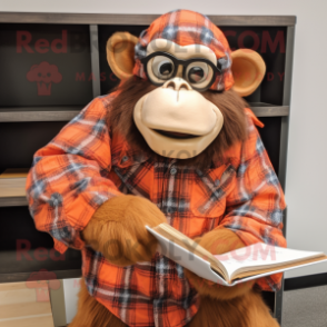 Orange Chimpanzee mascot costume character dressed with a Flannel Shirt and Reading glasses