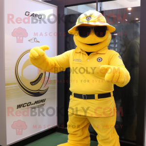 Yellow Para Commando mascot costume character dressed with a Polo Shirt and Bracelet watches