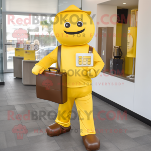 Yellow Chocolate Bar mascot costume character dressed with a Jumpsuit and Briefcases