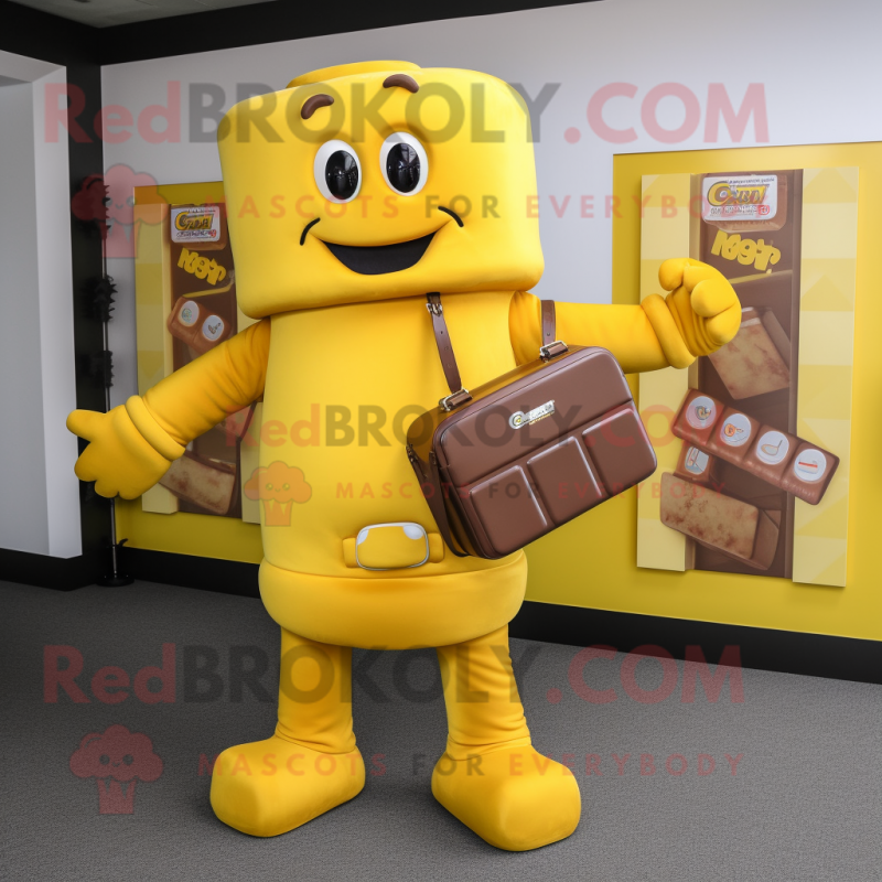 Yellow Chocolate Bar mascot costume character dressed with a Jumpsuit and Briefcases Yellow Chocolate Bar mascot costume character dressed with a Jumpsuit and Briefcases